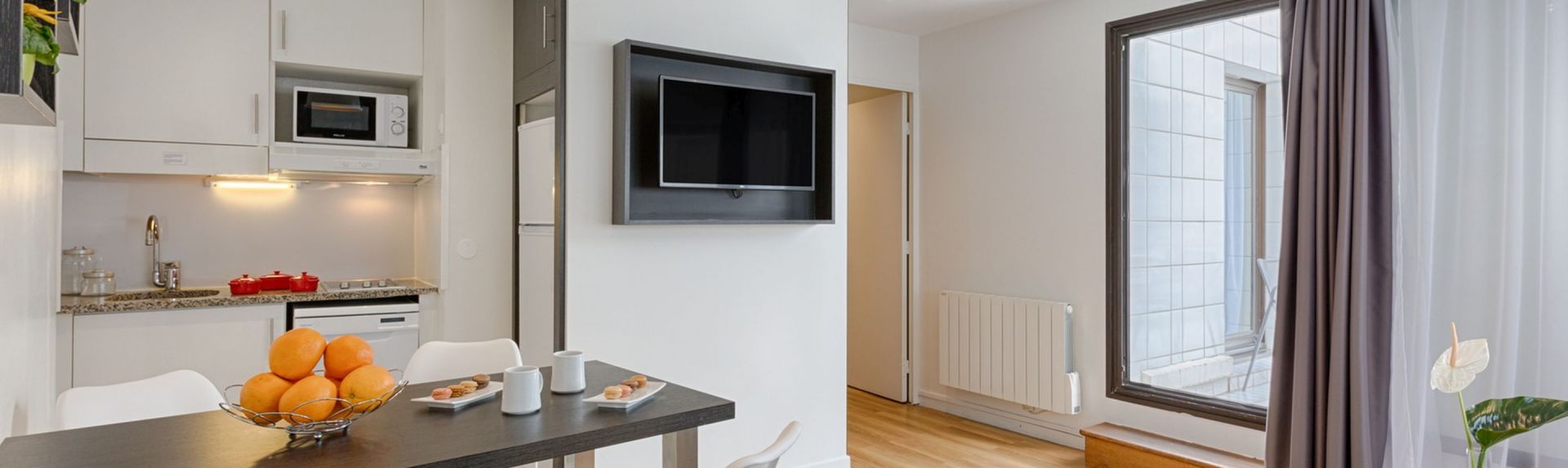 kitchen in apartment at apart hotel Citadines Austerlitz Paris