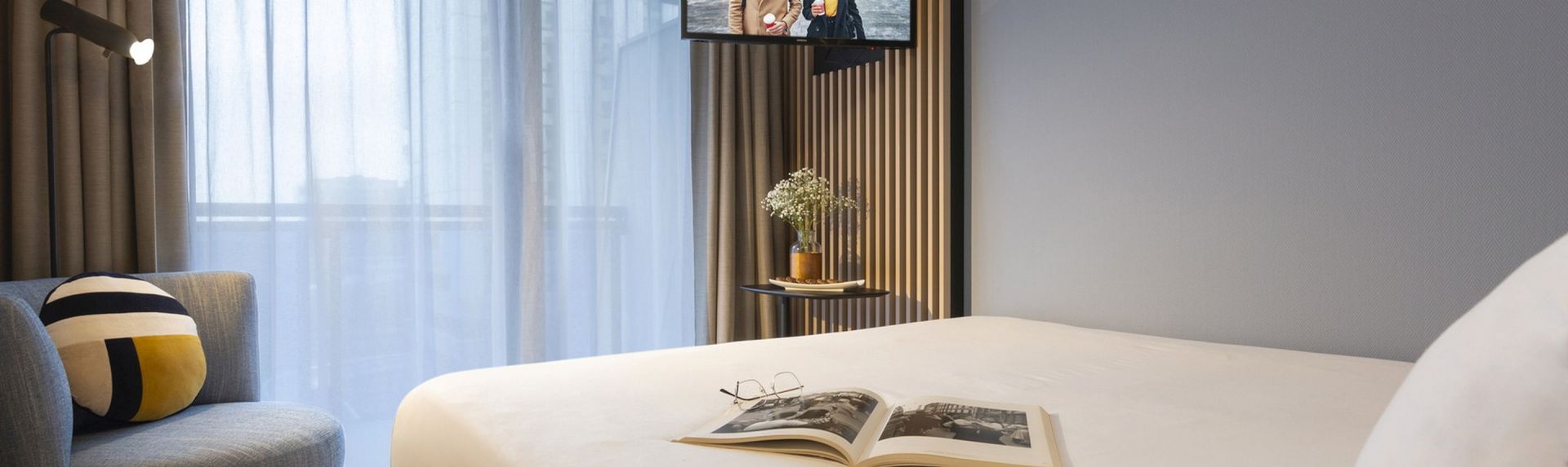 Bedroom of a Deluxe Apartment with Balcony